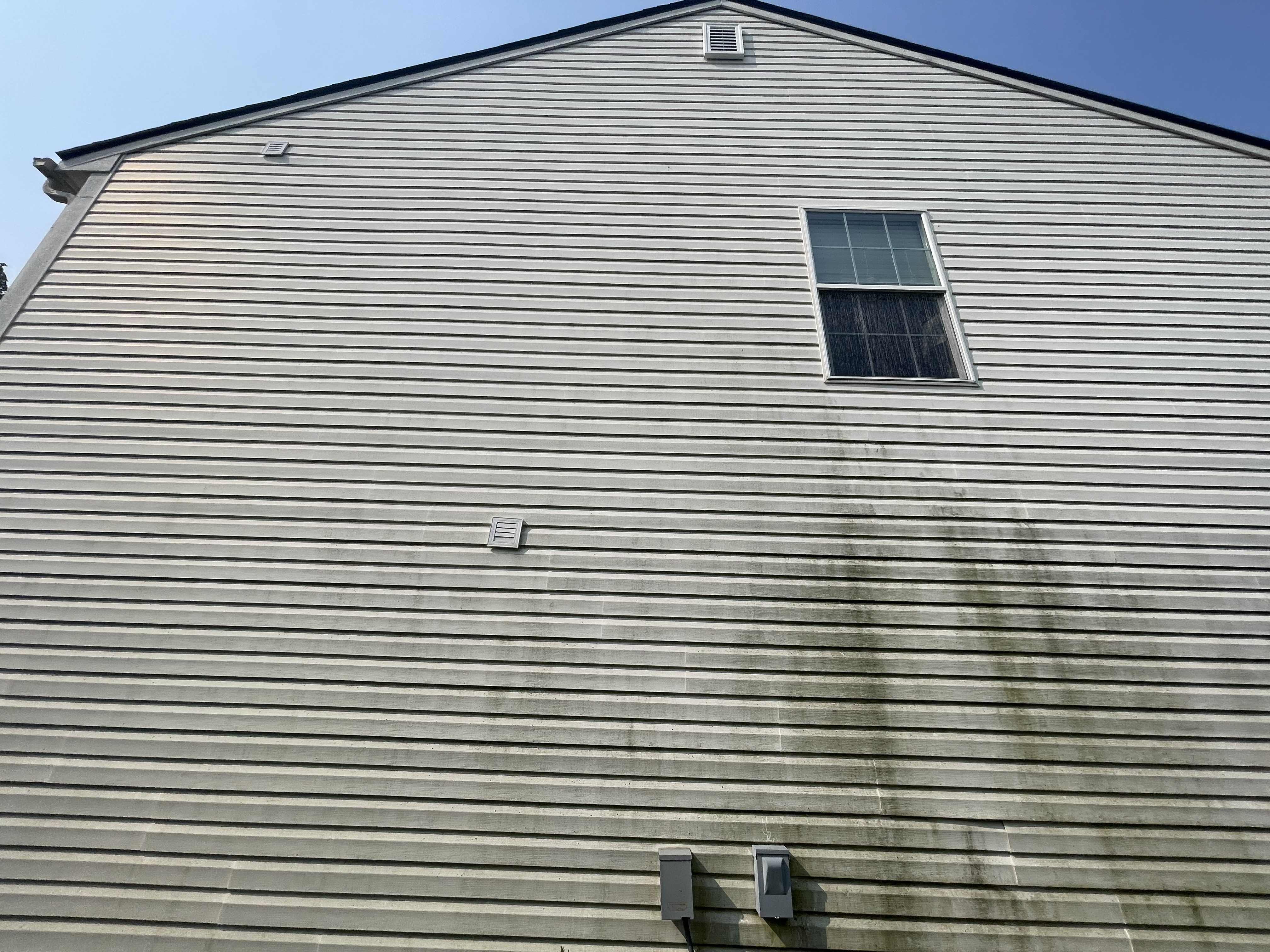House siding before wash